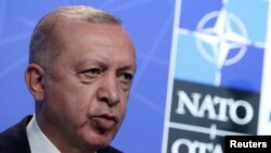 FILE PHOTO: Turkey's President Tayyip Erdogan holds a news conference during the NATO summit at the Alliance's headquarters in Brussels, Belgium