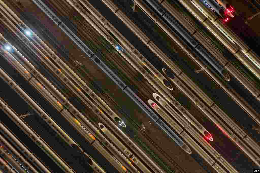 High speed trains are seen outside a maintenance workshop in Nanjing, in China's eastern Jiangsu province.