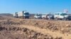 A convoy of trucks from the International Committee of the Red Cross (ICRC) are seen delivering lifesaving medical supplies on the road to Mekelle, in Tigray region, Ethiopia, Nov. 15, 2022.