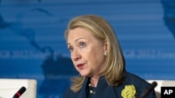 Secretary of State Hillary Rodham Clinton addresses the G8 foreign ministers at Blair House in Washington, April 11, 2012.