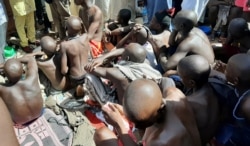 Men and boys are pictured after being rescued by police in Sabon Garin, in Daura local government area of Katsina state, Nigeria, Oct. 14, 2019.