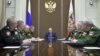 Russian President Vladimir Putin, center, chairs a meeting on the defense industry at the Bocharov Ruchei state residence in Sochi, Russia, Nov. 10, 2015. 