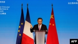 6月21日，李强在巴黎出席中法工商界晚餐会并致辞。