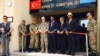 Somali Prime Minister Hassan Ali Khaire and the Chief of the Turkish military, General Hulusi Akar, in Uniform, along with Turkish Ambassador to Somalia, Olgan Bekar, jointly cut the ribbon for the inauguration of Turkey’s largest foreign military base in