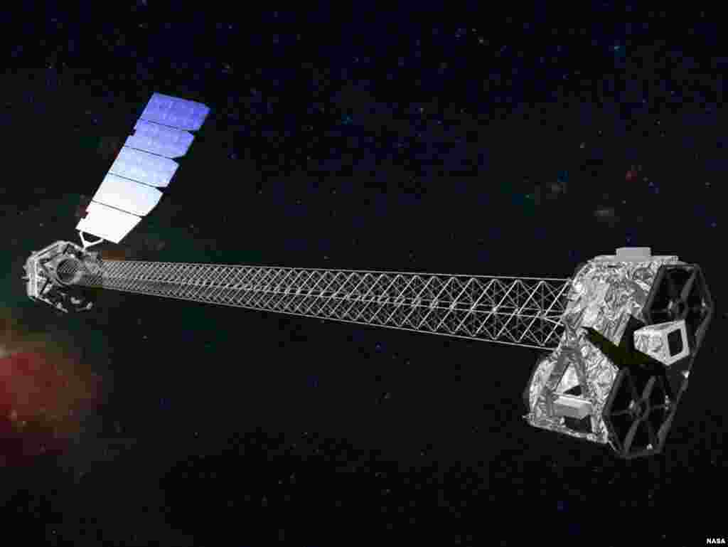 Artist's concept of NuSTAR on orbit that shows its 10- meter mast that separates the optics modules (right) from the detectors in the focal plane (left). (NASA)