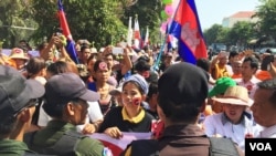 Several hundred protesters tried to approach the Senate Friday, but were blocked and forced back by police amid minor scuffles. (Robert Carmichael for VOA News)