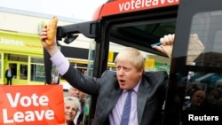 Former London Mayor Boris Johnson holds up a Cornish pasty during the launch of the Vote Leave bus campaign, in favor of Britain's exit from the European Union, in Truro, England, May 11, 2016.