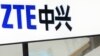 FILE- A sign for the ZTE booth is seen at the Mobile World Congress, the world's largest mobile phone trade show in Barcelona, Spain, Feb. 26, 2014.