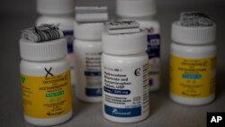 Bottles of several opioid based medication at a pharmacy in Portsmouth, Ohio, June 21, 2017.