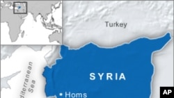 Syrian Tanks Shell Homs Neighborhood