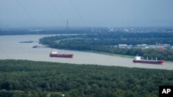 Mississippi river traffic moves in the aftermath of Hurricane Ida, Aug. 30, 2021, near Lafitte, La. 