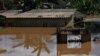 Sebuah rumah terendam banjir di Mario Campos, negara bagian Minas Gerais, Brazil, 12 Januari 2022. (REUTERS/Washington Alves)