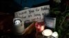 Candles and messages are left on the sidewalk in front of the Supreme Court to honor the late Justice Ruth Bader Ginsburg, in Washington, Sept. 19, 2020.