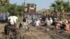 Farmers confront riot police at Letpadaung copper mine in northwestern Myanmar Dec. 22, 2014. 