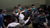 Chaos Erupts in Hong Kong Legislature Between Pro-Democracy, Pro-China Factions