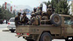 FILE - Taliban special force fighters arrive inside the Hamid Karzai International Airport after the U.S. military's withdrawal, in Kabul, Afghanistan, Aug. 31, 2021. 