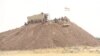 IS Flees Iraqi Villages, Leaving Lethal Roadside Bombs