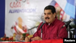 Venezuela's President Nicolas Maduro speaks during an event with supporters in Caracas, Nov. 15, 2017.