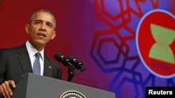 U.S. President Barack Obama delivers remarks at the ASEAN Business and Investment Summit in Kuala Lumpur, Malaysia Nov. 21, 2015.