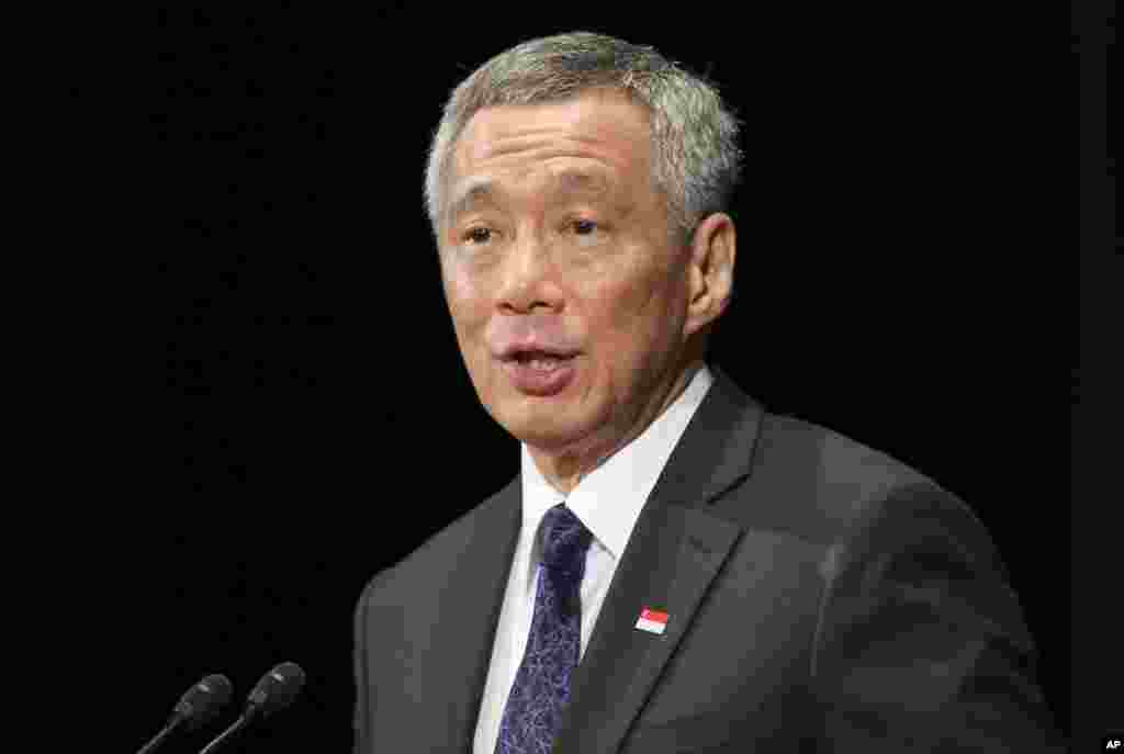 Perdana Menteri Singapura Lee Hsien Loong, putra Lee Kuan Yew, dalam sebuah acara di Tokyo, 2014. (AP/Koji Sasahara)