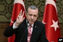 Turkey's President Recep Tayyip Erdogan addresses local administrators, in Ankara, Feb. 8, 2017.