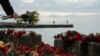 A person lays flowers in memory of passengers and crew members of Russian military Tu-154, which crashed into the Black Sea on its way to Syria on Sunday, at an embankment in the Black Sea resort city of Sochi, Russia, December 26, 2016. 