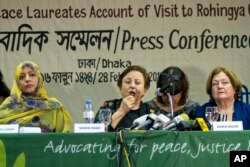 FILE - Nobel Peace laureates, from left, Yemen's Tawakkol Karman, Iran's Shirin Ebadi and Ireland's Mairead Maguire address a press conference after their visit to the Rohingya refugee camps in Dhaka, Bangladesh, Feb. 28, 2018.
