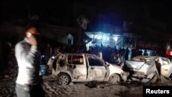Lokasi serangan bom mobil di distrik Amil, Baghdad, Irak, Senin (20/3).