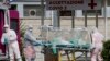 WHO Urges Nations to Enact Tougher Measures to Combat Coronavirus