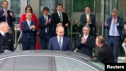 Taoiseach Micheal Martin, leader of the Fianna Fail party, leaves the Convention Centre, en route to the president's residence to receive his seal of office in Dublin, Ireland, June 27, 2020.