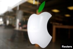 FILE - The logo of Apple (AAPL) is seen in Los Angeles, California, United States, April 22, 2016.