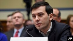 FILE- Pharmaceutical chief Martin Shkreli speaks on Capitol Hill in Washington, during the House Committee on Oversight and Reform Committee hearing on his former company's decision to raise the price of a lifesaving medicine, Feb. 4, 2016.