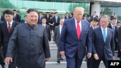 도널드 트럼프 전 미국 대통령과 문재인 전 한국 대통령, 김정은 북한 국무위원장이 지난 2019년 6월 판문점에서 만났다. 