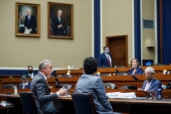 Dr. Rick Bright, former director of the Biomedical Advanced Research and Development Authority, testifies before a House panel in Washington, May 14, 2020. Bright, among others, has warned against unproven treatments for COVID-19.