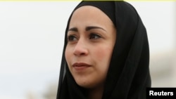 Samantha Elauf, who was denied a sales job at an Abercrombie Kids store in Tulsa in 2008, is pictured at the U.S. Supreme Court in Washington, Feb. 25, 2015.