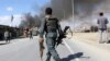 FILE - Afghan security forces respond to a suicide attack in Kabul, Afghanistan, March 1, 2017.