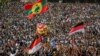 Ethiopians rally in solidarity with Prime Minister Abiy Ahmed in Meskel Square in the capital, Addis Ababa, Ethiopia, June 23, 2018. A deadly explosion struck the huge rally for Ethiopia's reformist new prime minister on Saturday shortly after he spoke.
