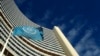 FILE - The flag of the International Atomic Energy Agency (IAEA) flies in front of its headquarters in Vienna, Austria.