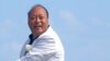 FILE -- Billionaire Li Jinyuan is the CEO of China's Tiens Group, which spans e-commerce, hotel and tourism and biotech industries.