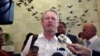 FILE - South African Minister for Trade and Industry Rob Davies talks to the press.
