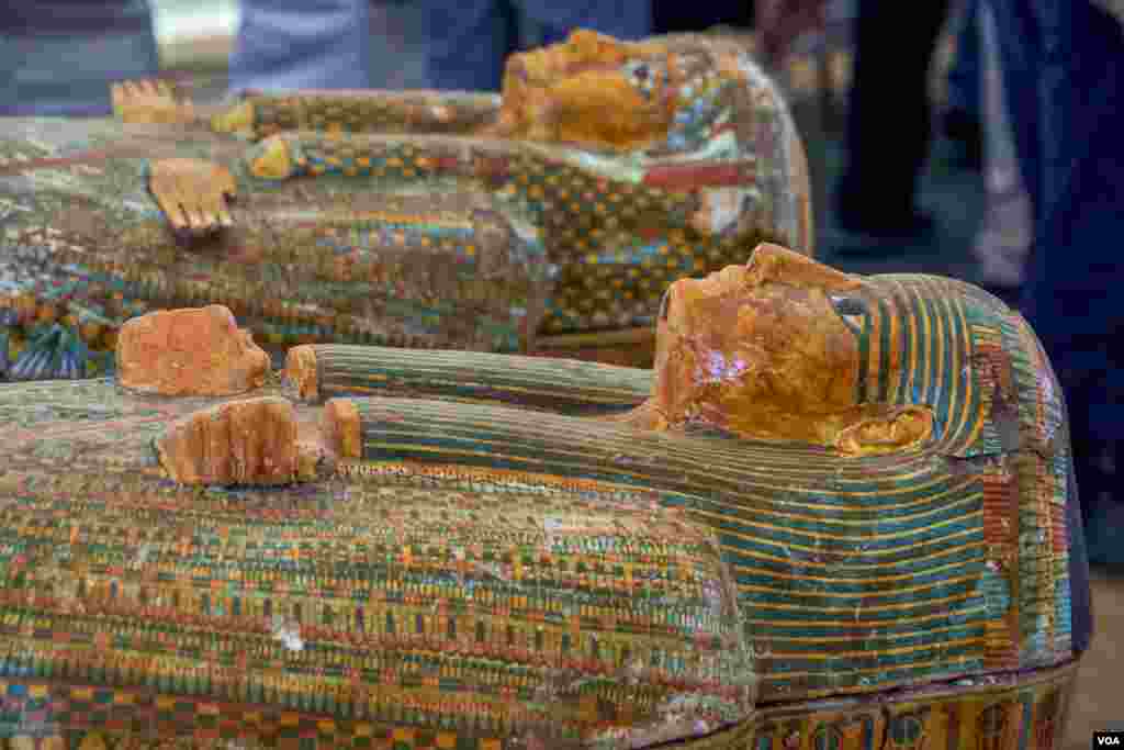 Dr. Waziri explains, "fisted hands position on the coffins is for men, and the open hands' gesture is for women." (H. Elrasam/VOA)