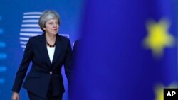 British Prime Minister Theresa May arrives for an EU summit in Brussels, Oct. 17, 2018. 