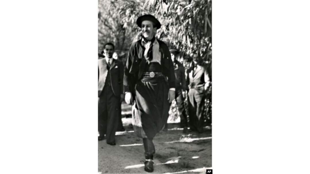 Walt Disney in full gaucho dress at an event hosted by the Cartoonists Association of Argentina.