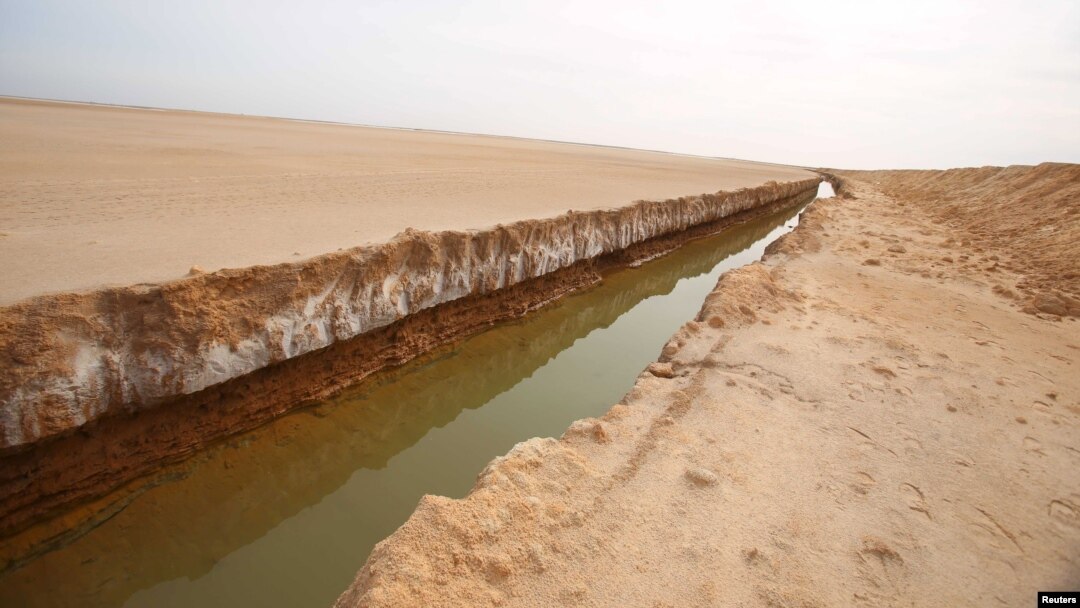 A general view of a trench, that forms part of a barrier along the frontier with Libya, is seen in Sabkeht Alyun, Tunisia February 6, 2016. 