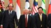 Vietnamese General Secretary Nguyen Phu Trong, center, arrives at venue for the online ASEAN Summit in Hanoi, Vietnam, Nov. 12, 2020.