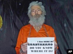 FILE - Undated handout photo shows retired FBI agent Robert Levinson. His family received photographs in April 2011.