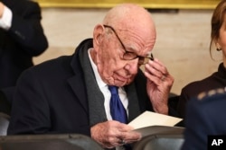 Rupert Murdoch arrives in the Rotunda of the U.S. Capitol in Washington before the inauguration of President Donald Trump on Jan. 20, 2025.