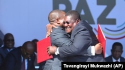Filipe Nyusi (esquerda) e Ossufo Momade (direita)