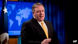 FILE - Secretary of State Mike Pompeo speaks at a news conference at the State Department in Washington.