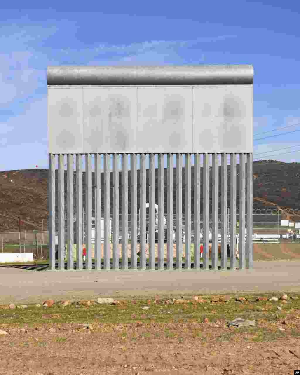 A border wall prototype stands in San Diego near the Mexico-U.S. border, seen from Tijuana, Mexico, Dec. 22, 2018.